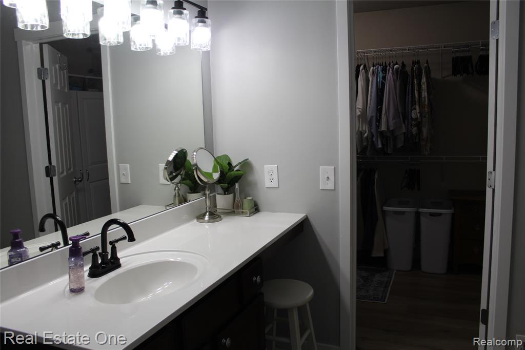 8662 Pinnebog River Drive, Fowlerville, MI 48836 — Photo 13