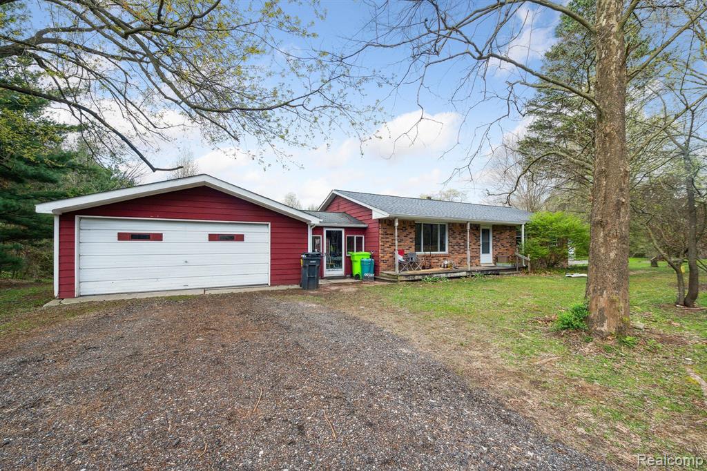 7107 E HIGHLAND Road, Howell, MI 48843 — Photo 7
