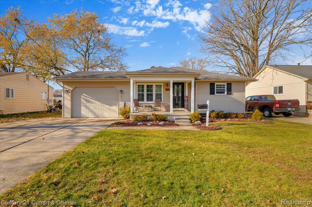 9061 Oporto Street, Livonia, MI 48150 — front exterior