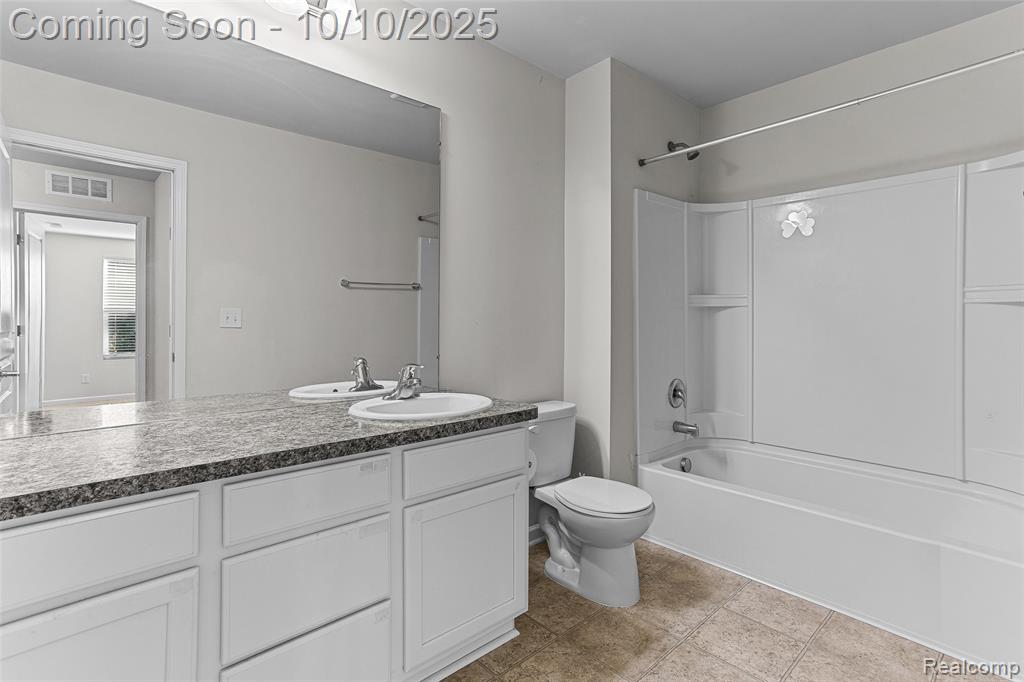 57797 Village Drive, New Hudson, MI 48165 — Photo 32