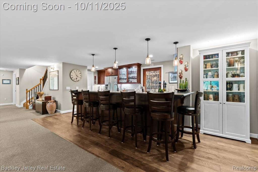 9430 Sheltering Oaks Drive, Brighton, MI 48114 — Photo 24