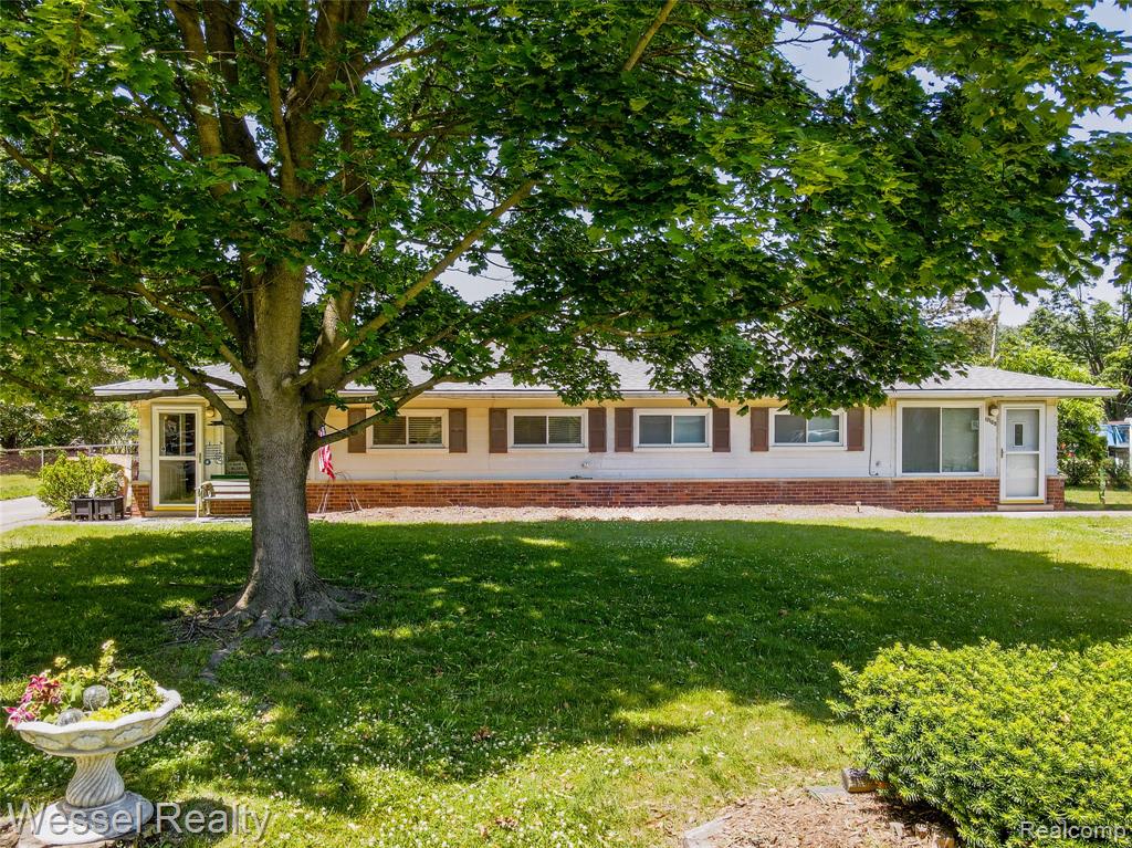 57121 OMO Road, Ray, MI — front exterior
