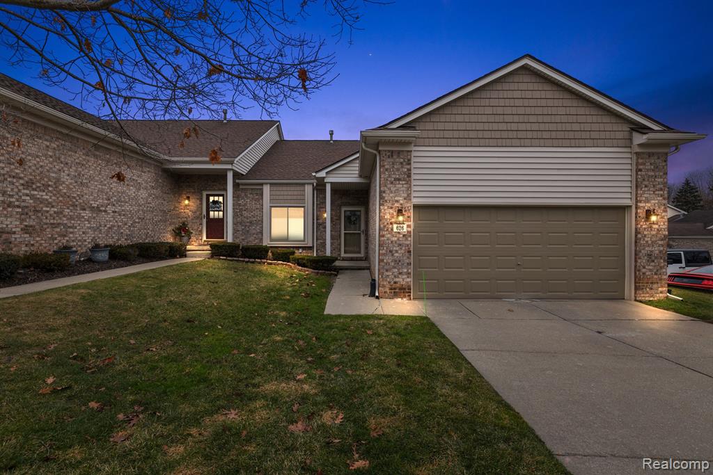 626 WOODSIDE Drive, 62, Milford, MI 48381 — front exterior