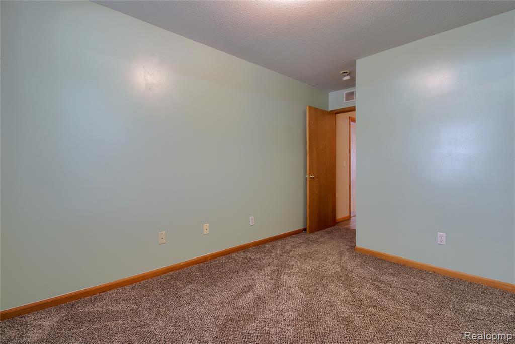 9743 Wildflower Court, Belleville, MI 48111 — Photo 17