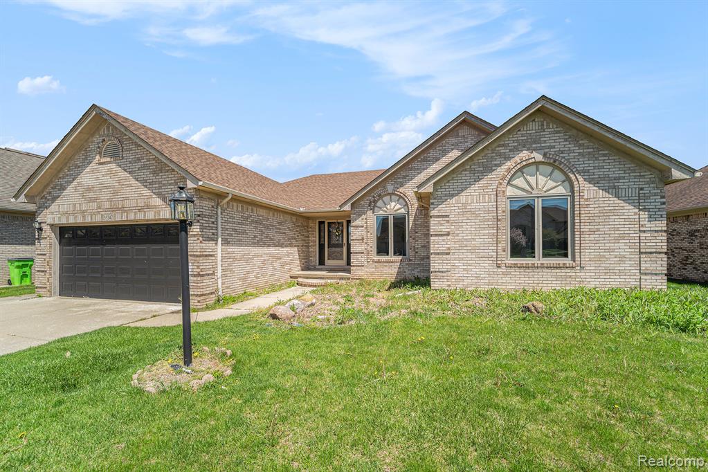 53242 Clarion Drive, Macomb, MI 48042 — front exterior