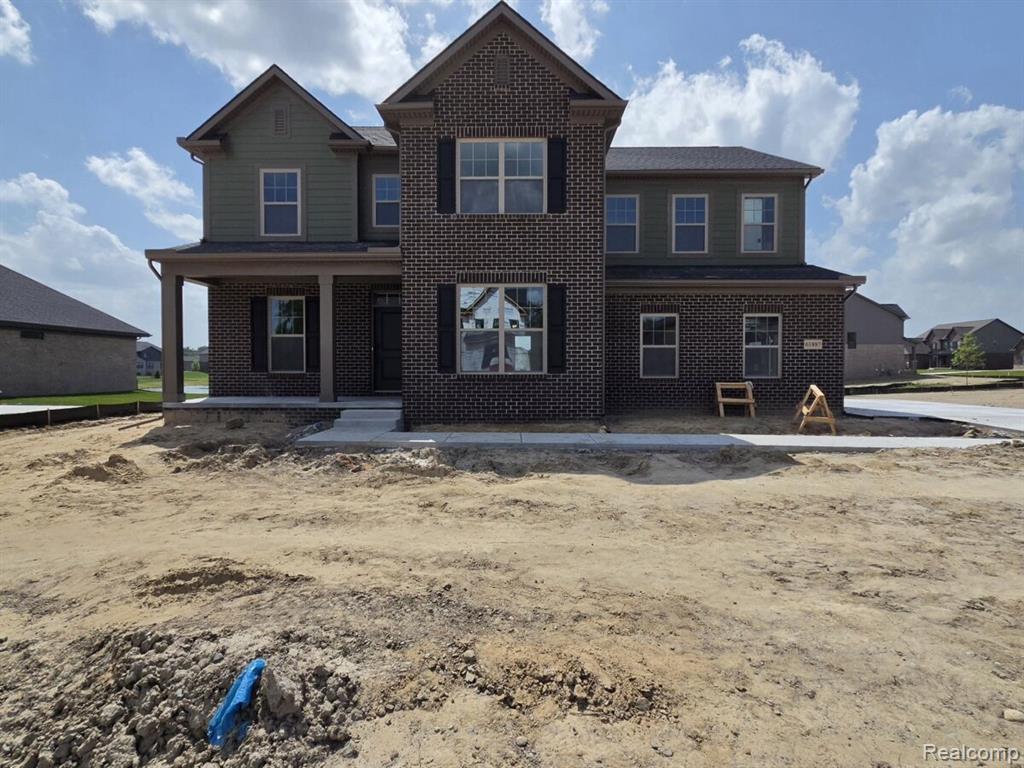 61887 Hevel Lane, Washington, MI — front exterior