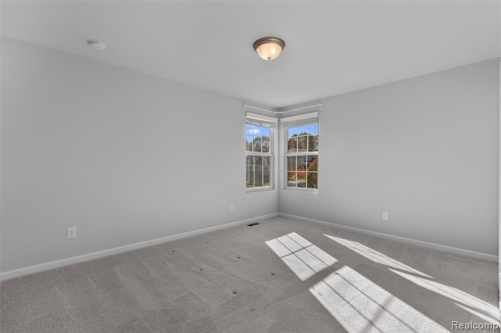 57570 Village Drive, New Hudson, MI 48165 — Photo 33