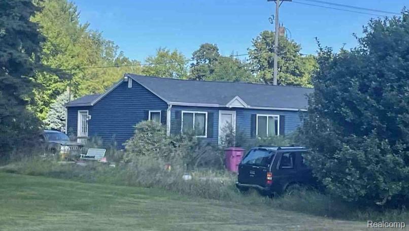 4458 S M 52, Owosso, MI 48867 — front exterior