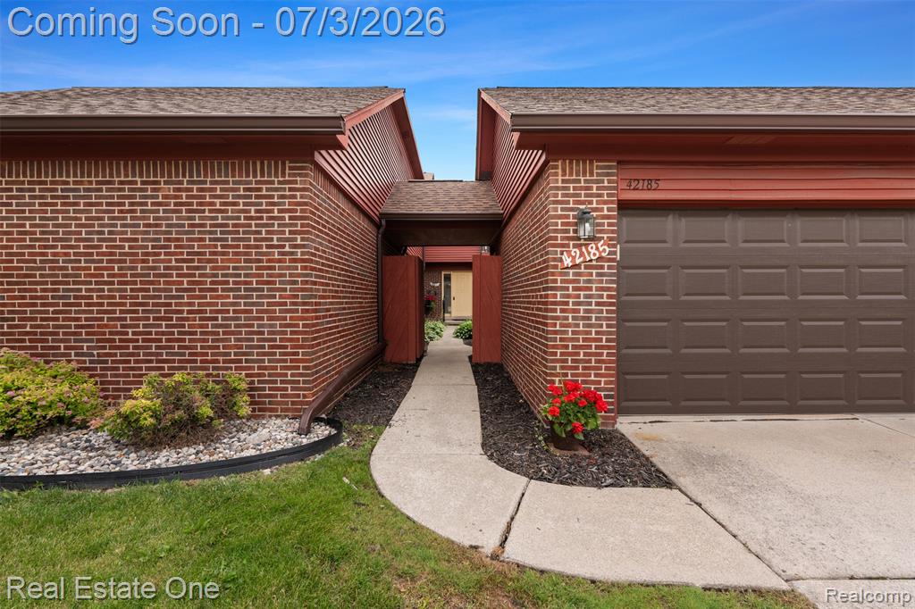 42185 Lochmoor Street, Clinton Twp, MI 48038 — front exterior