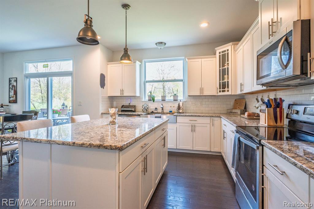 1402 SECRETARIAT Way, Howell, MI 48843 — Photo 12