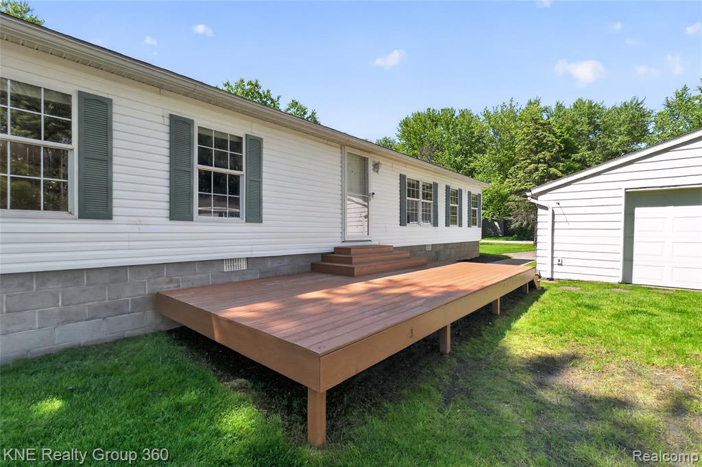 672 Red Oaks Drive, Howell, MI 48843 — Photo 30