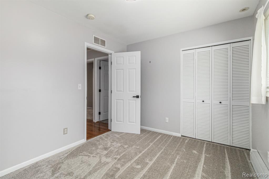 2145 Helmsford Drive, Wolverine Lake, MI 48390 — Photo 34