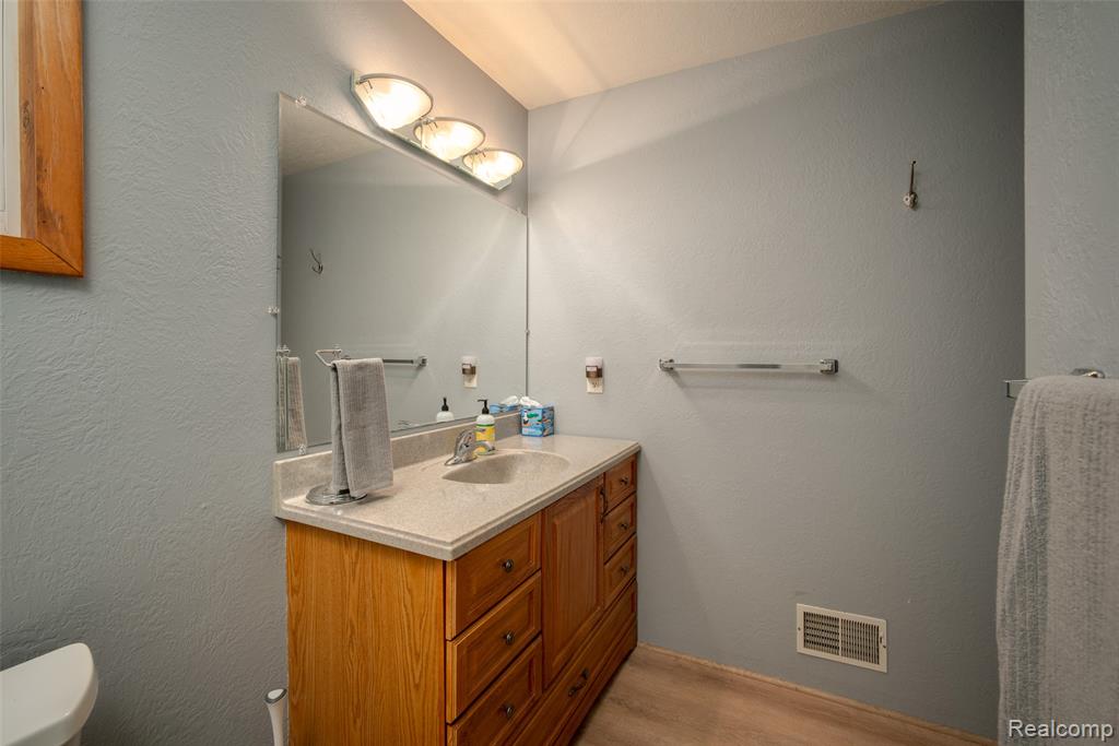 6954 AARWOOD Trail NW, Rapid City, MI 49676 — Photo 25
