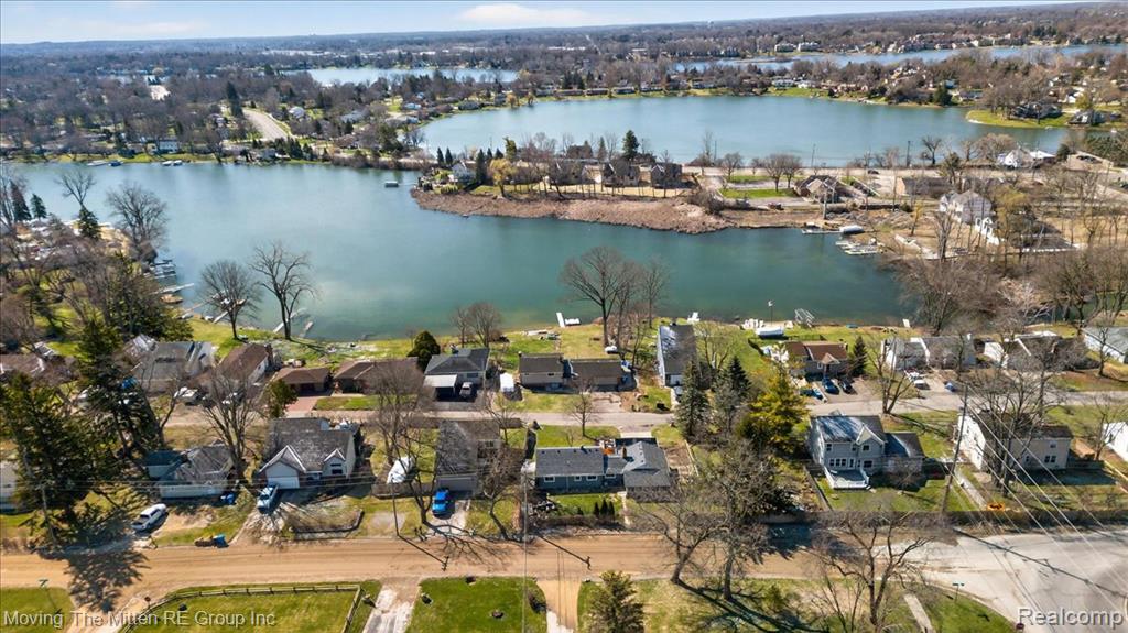 Aerial view of residential area with a large body of water