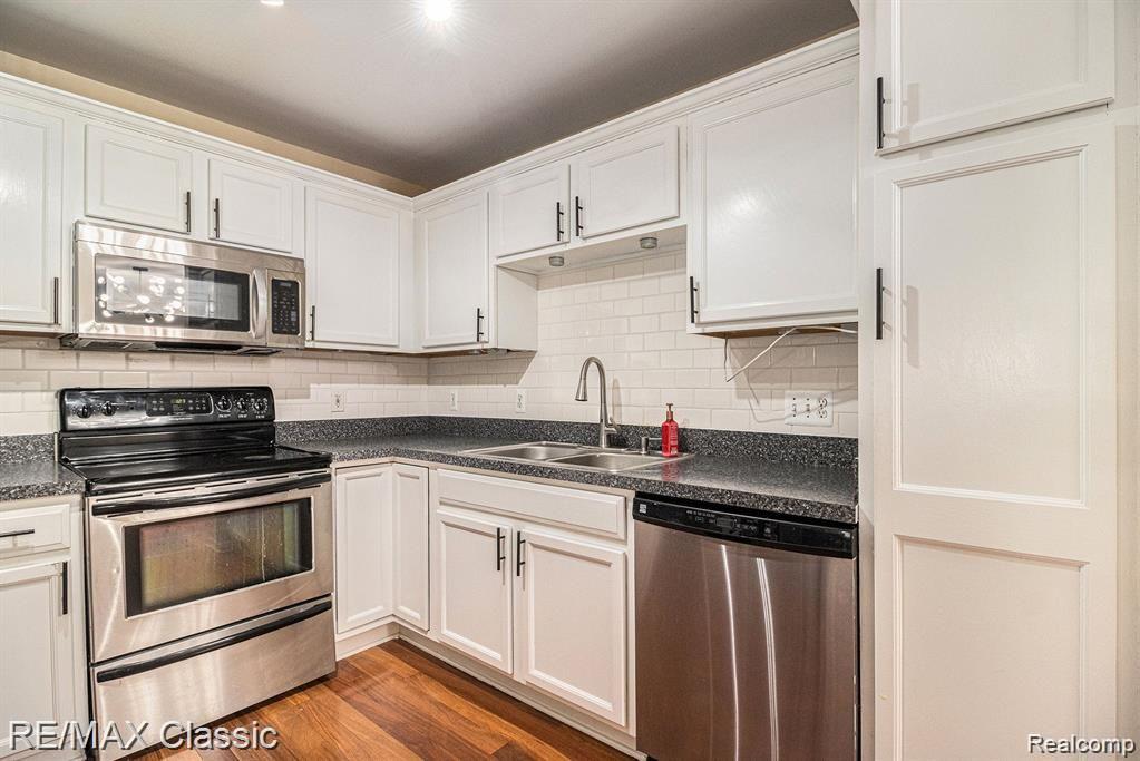 428 Boardwalk Drive, Walled Lake, MI 48390 — Photo 13