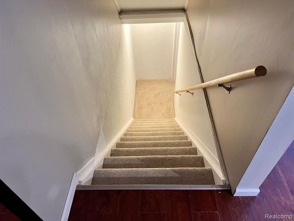1623 WIMBLEDON Drive, 16, Walled Lake, MI 48390 — Photo 24