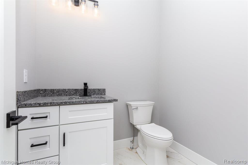 2910 LOON Drive, Wixom, MI 48393 — Photo 58