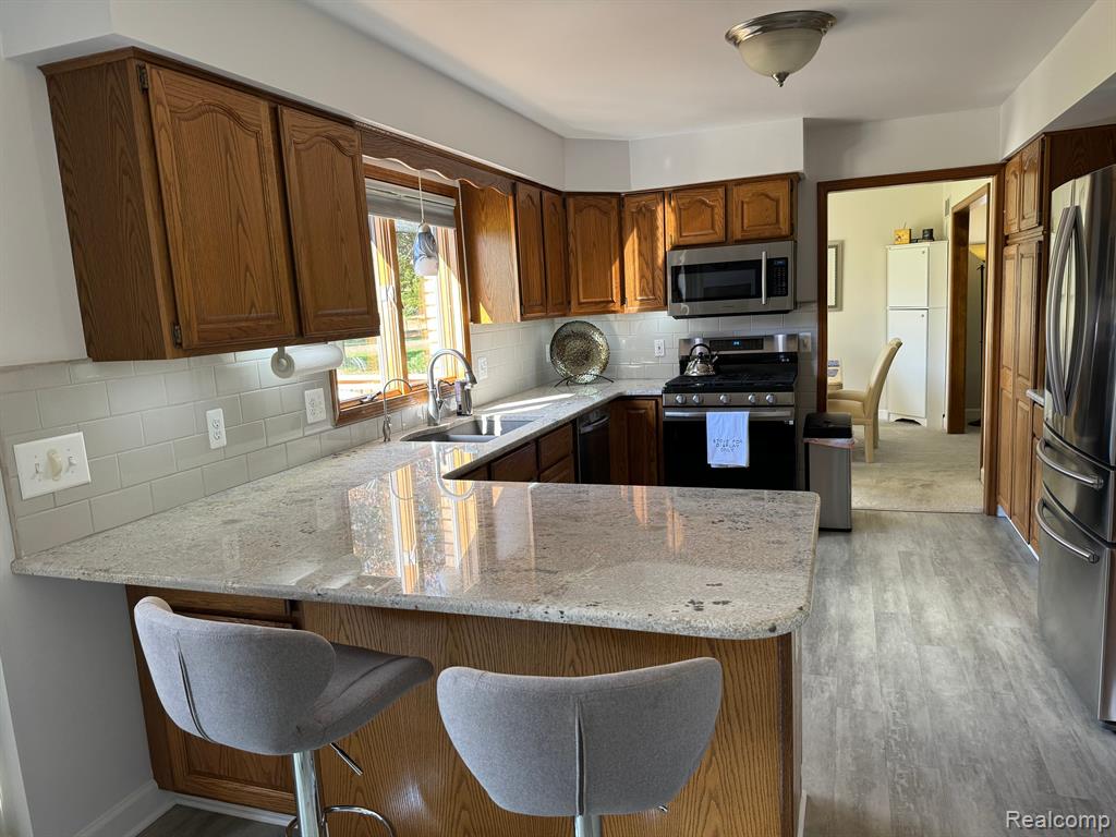 2606 PIGEON FORGE Drive, Brighton, MI 48114 — Photo 11