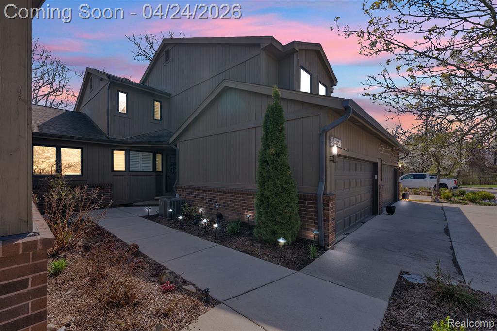 9859 Hawthorne Glen Drive, Grosse Ile, MI 48138 — front exterior