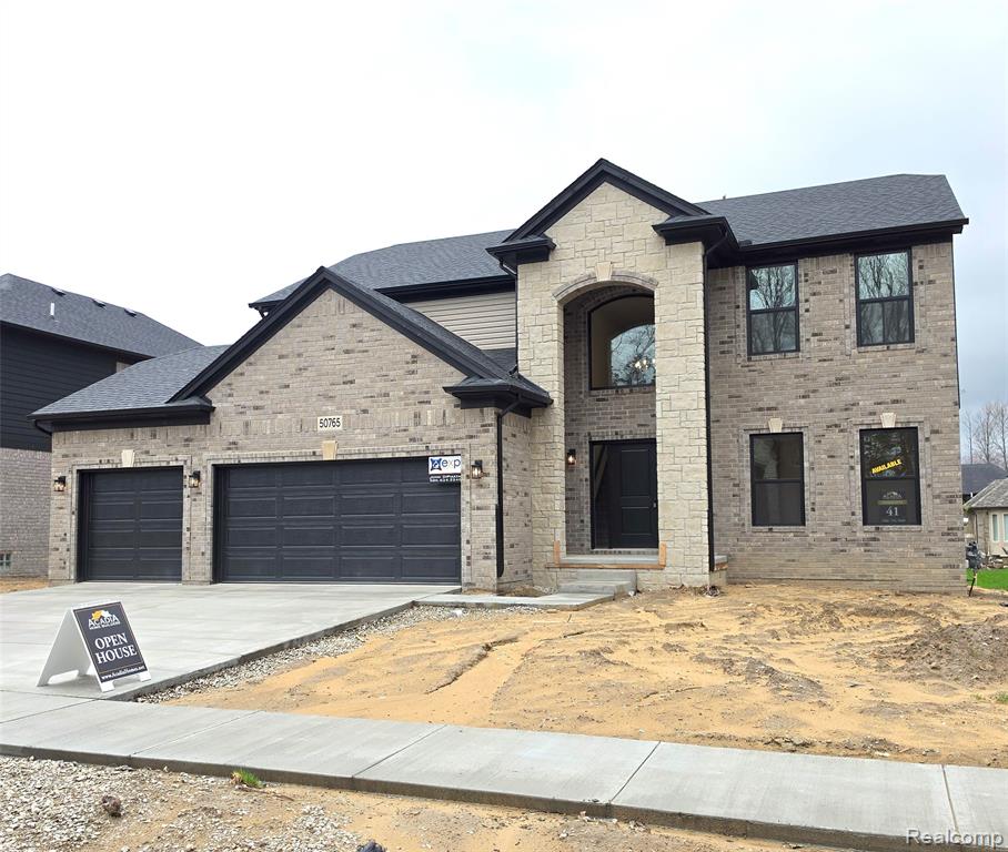 50765 Mistwood Drive, Macomb, MI 48042 — front exterior
