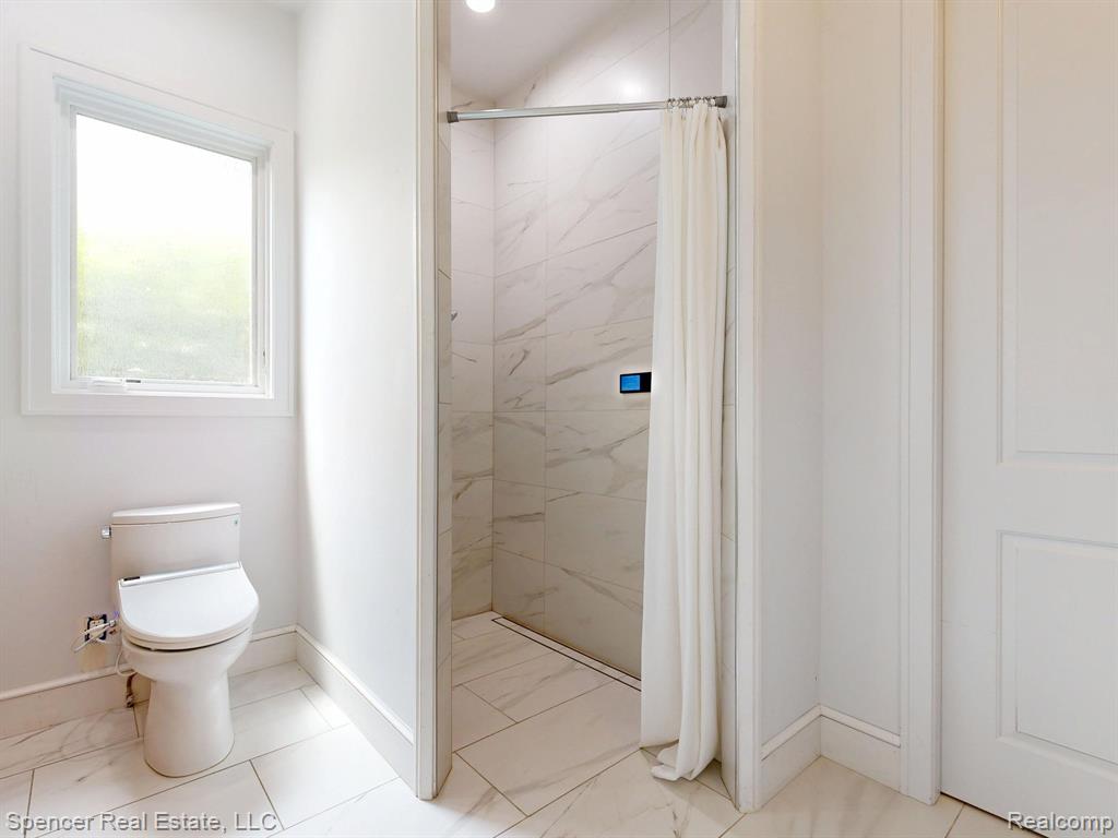 571 Dunleavy Drive, Highland, MI 48356 — Photo 17