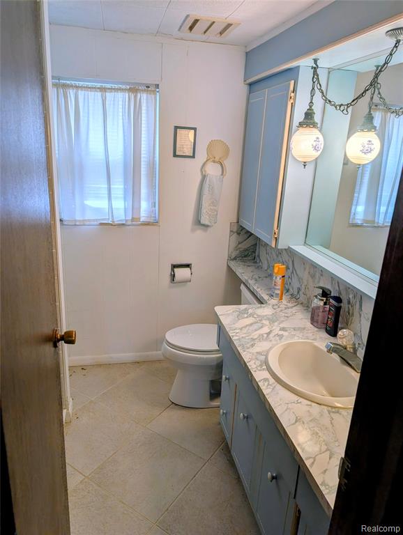 8461 Woodland Shore Drive, Brighton, MI 48114 — Photo 16