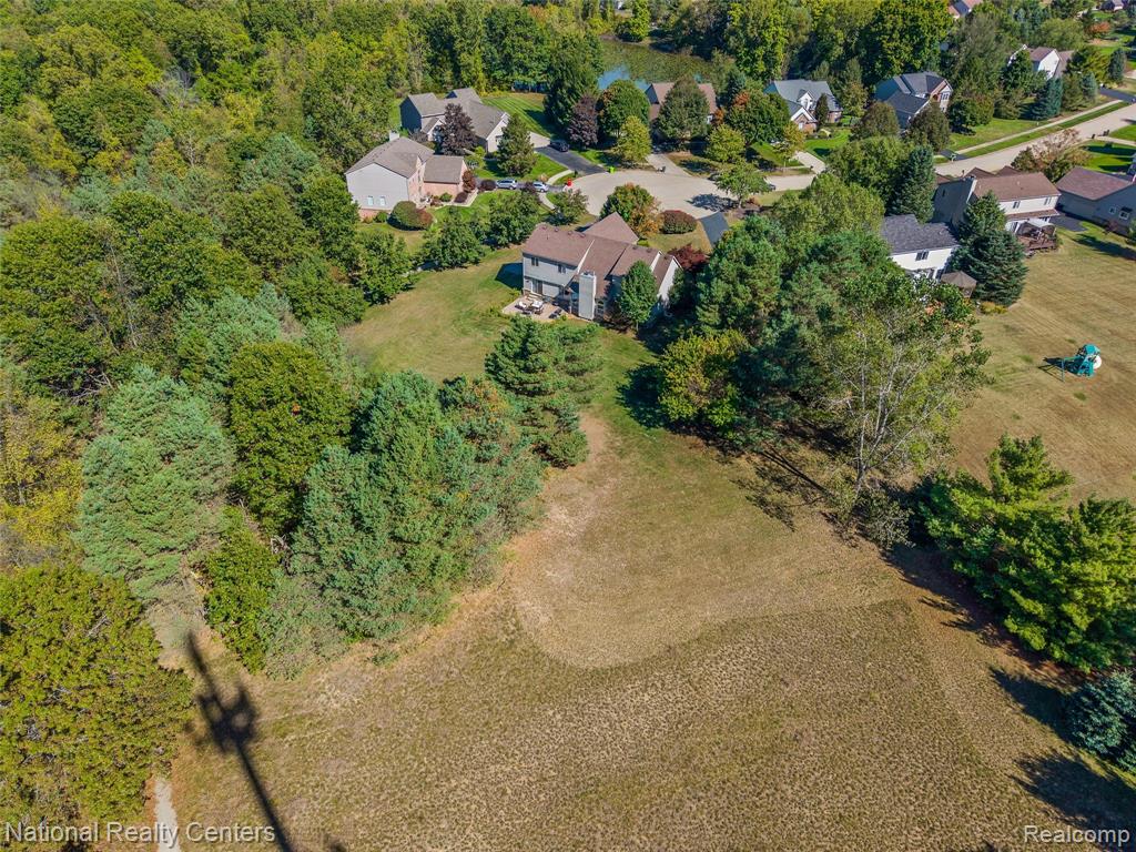 678 Joshua Drive, Highland, MI 48356 — Photo 45