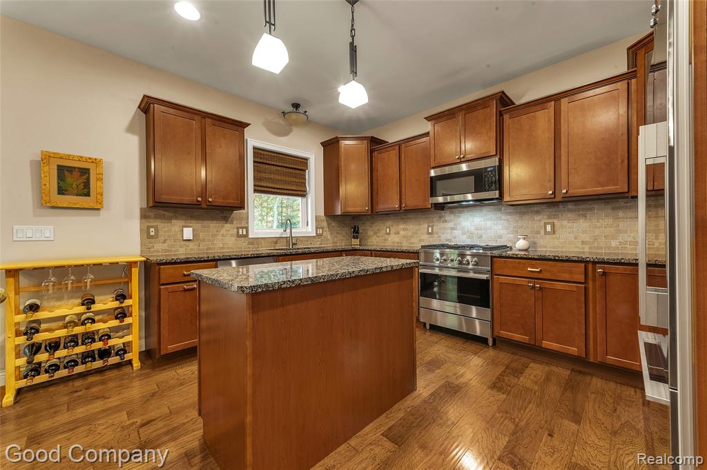 8726 Sunrise Mist Drive, Pinckney, MI 48169 — Photo 13
