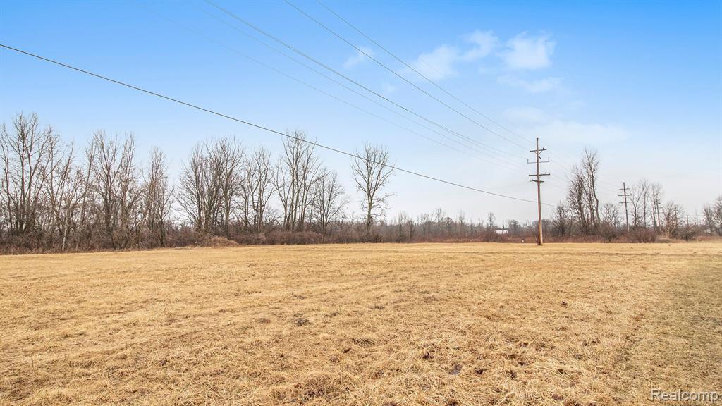 51230 WILLIS Road, Belleville, MI 48111 — front exterior