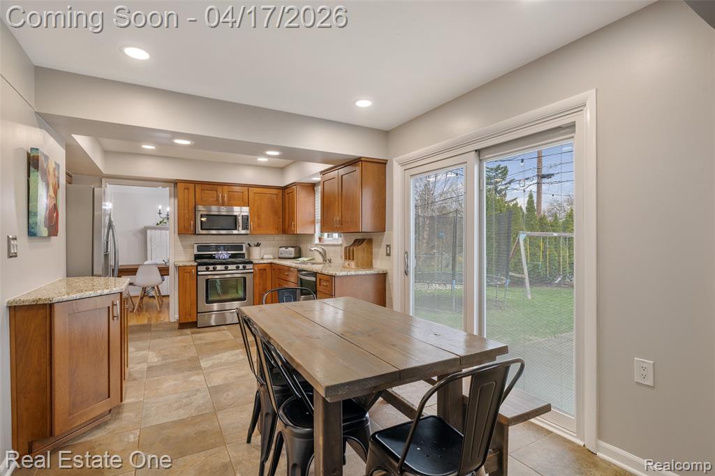 Dining space featuring baseboards and recessed lighting