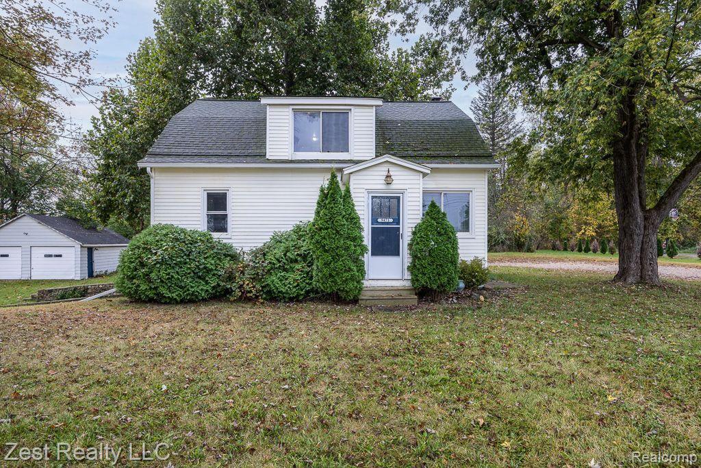 9471 PONTIAC LAKE Road, White Lake, MI — front exterior