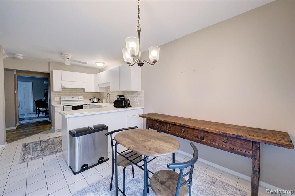 9329 EASTWIND Drive, Livonia, MI 48150 — Photo 21