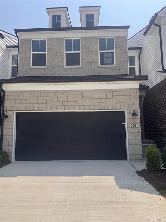 5561 E Spaniel Drive, Ann Arbor, MI 48108 — front exterior