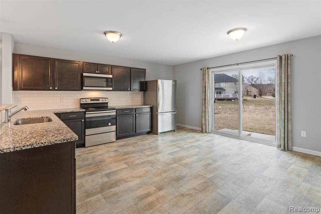 7193 PRIMROSE Lane, Grand Blanc, MI 48439 — Photo 8