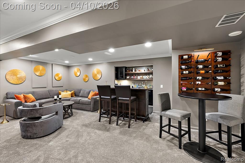 Finished Lower Level Wet Bar w/Seating Area