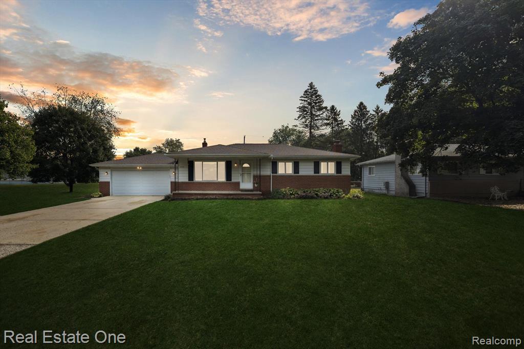2436 Woodlawn Street, Wolverine Lake, MI 48390 — front exterior