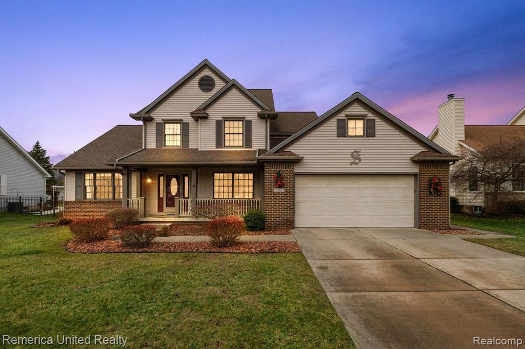 686 W CALEDONIA Street, Howell, MI 48843 — front exterior