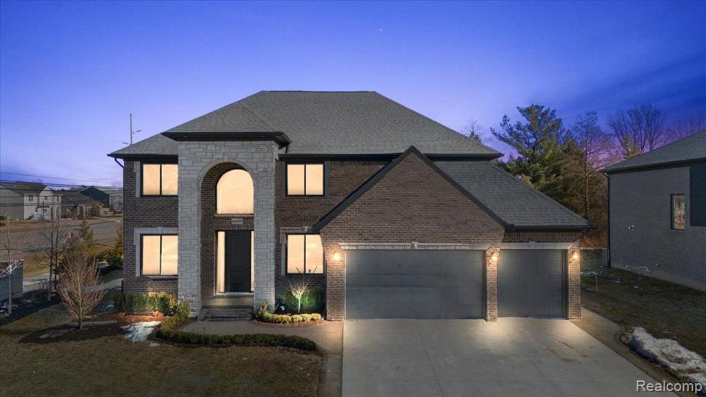 50998 MISTWOOD Drive, Macomb, MI 48042 — front exterior