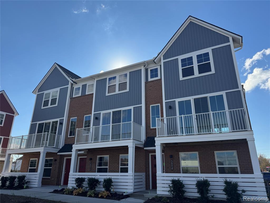 56054 Madison Lane, New Hudson, MI 48165 — front exterior