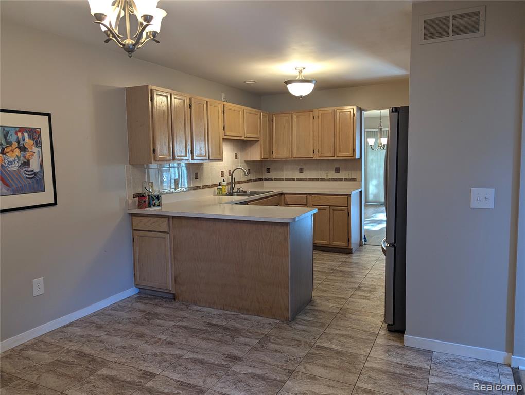 9327 Eastwind Drive, Livonia, MI 48150 — Photo 16