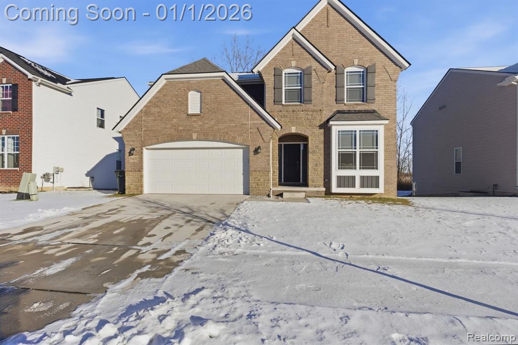 51672 Times Square Drive, Shelby Twp, MI 48315 — front exterior