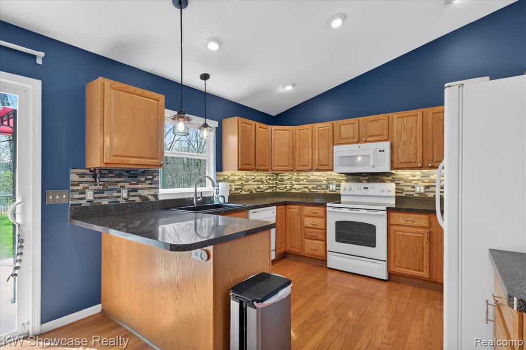 662 Tierney Avenue, Highland, MI 48356 — Photo 11