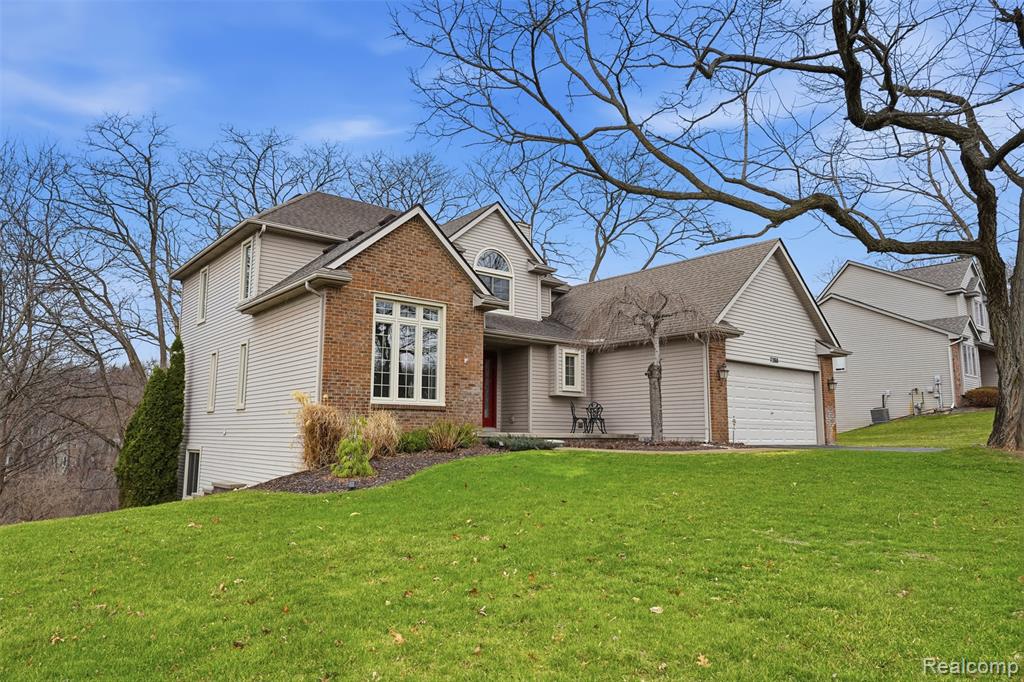 7288 Foxgate Drive, Brighton, MI 48116 — front exterior
