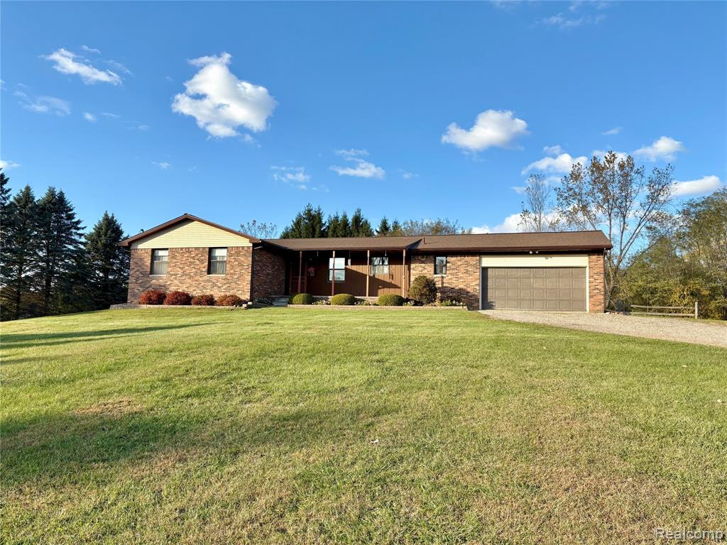 6080 W Coon Lake Road, Howell, MI 48843 — front exterior