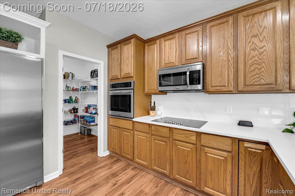 9438 Deer Creek Court, Brighton, MI 48114 — Photo 17