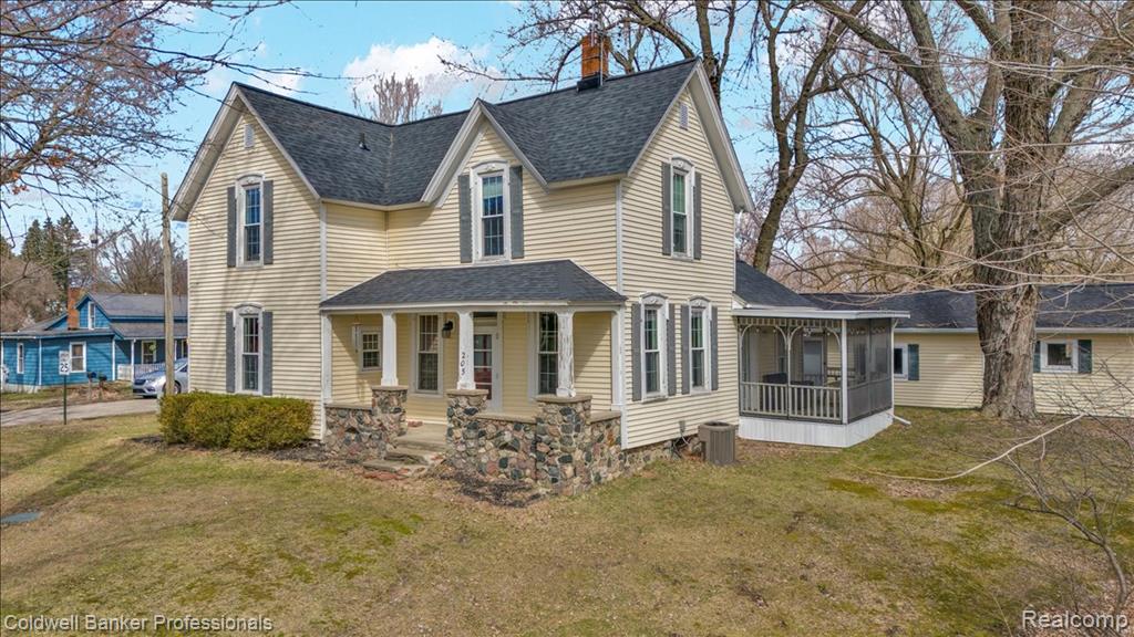 205 S Lake Pleasant Road, Attica, MI 48412 — front exterior