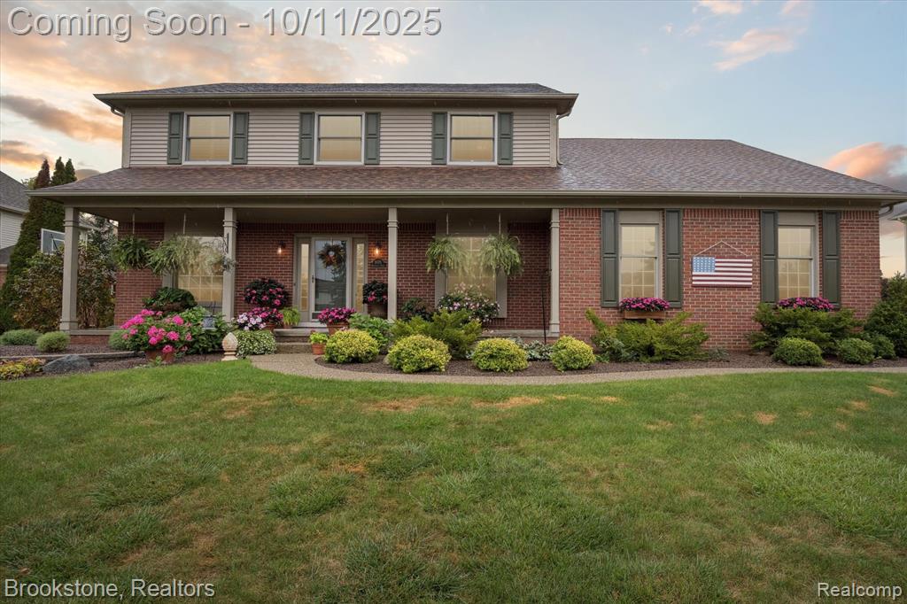 9079 Woodgrove Drive, Plymouth, MI 48170 — front exterior