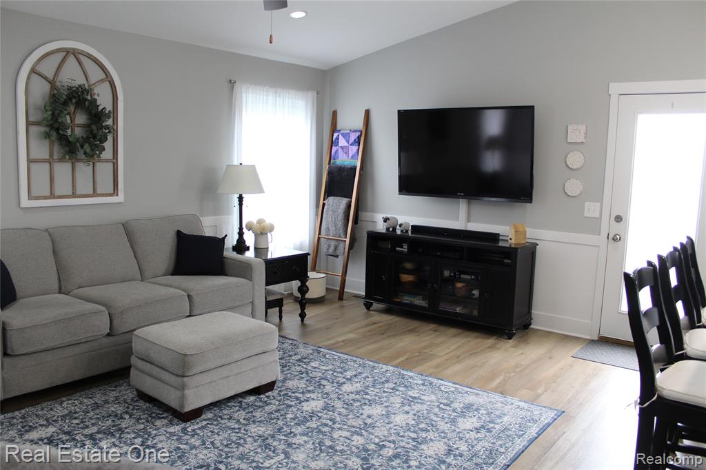 8662 Pinnebog River Drive, Fowlerville, MI 48836 — Photo 5