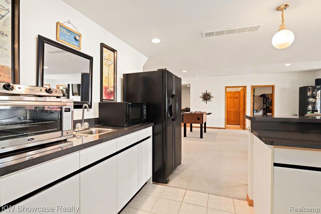 8579 PINE COVE Drive, Commerce Twp, MI 48382 — Photo 48