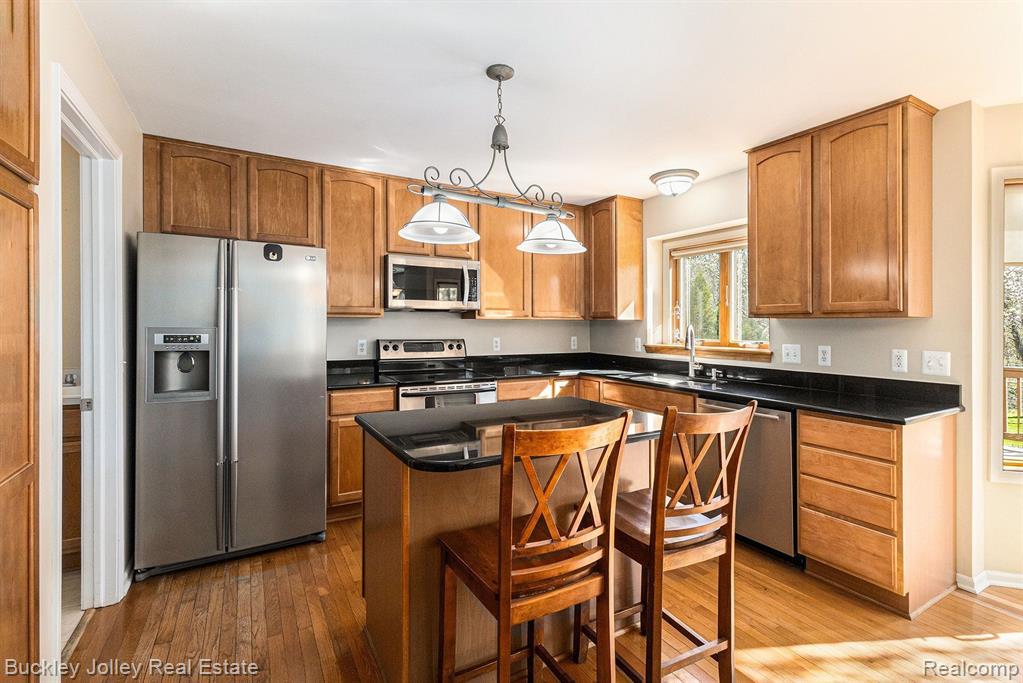 8537 SADDLEWOOD Drive, Brighton, MI 48116 — Photo 12